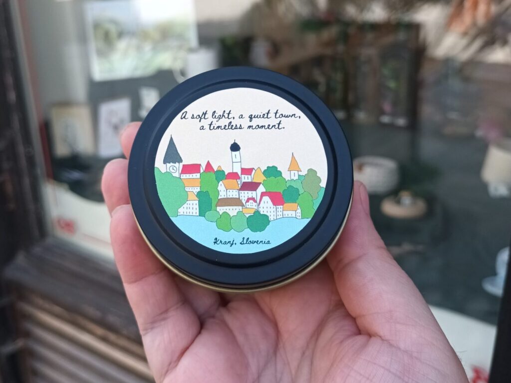 dišeča sveča z motivom Kranja